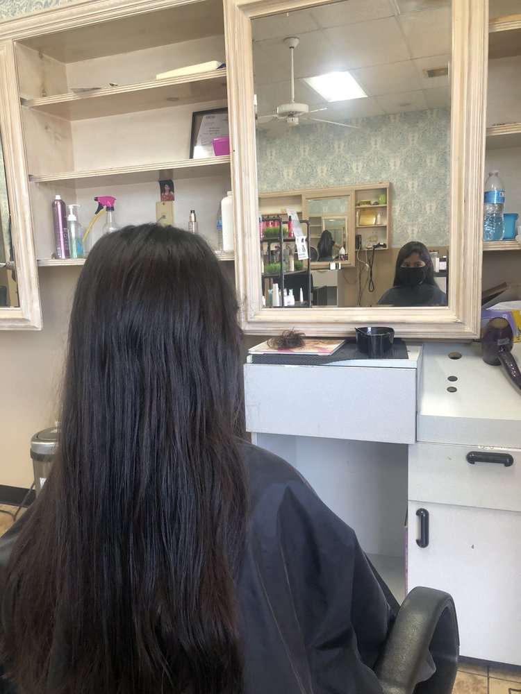 Flores Hair Design Logo