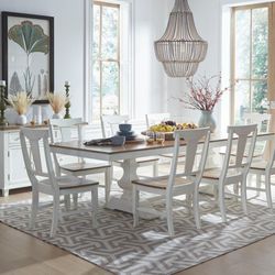 Barewood - Nine piece table set in off white and brown top. Matching credenza in background.