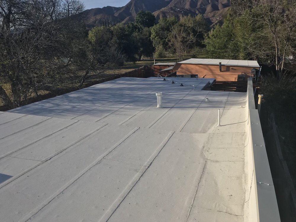 Slide of Aztec Roofing