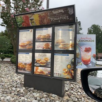 Biscuitville - a menu and a car in the background - Breakfast & Brunch Near Me - Fuquay Varina, North Carolina