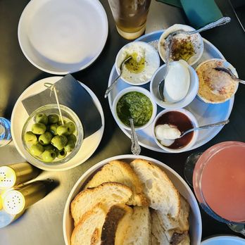 FioRito Ristorante - Sourdough bread with all the dips and spreads. Add olives. - Tuscan Near Me - Wichita, Kansas FioRito Ristorante - Sourdough bread with all the dips and spreads. Add olives. - Tuscan Near Me - Wichita, Kansas