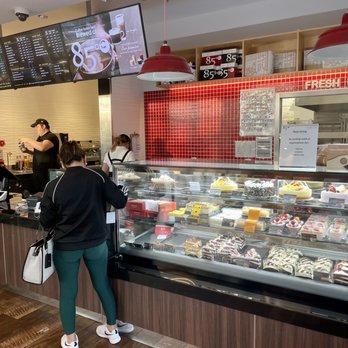 85°C Bakery Cafe-Pleasanton - Cake and order counter with the screen menus. - Bakeries Near Me - Pleasanton, California 85°C Bakery Cafe-Pleasanton - Cake and order counter with the screen menus. - Bakeries Near Me - Pleasanton, California