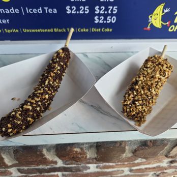 Sugar 'n Spice - Frozen Banana Frozen Cheesecake-On-A-Stick - Ice Cream & Frozen Yogurt Near Me - Newport Beach, California Sugar 'n Spice - Frozen Banana Frozen Cheesecake-On-A-Stick - Ice Cream & Frozen Yogurt Near Me - Newport Beach, California