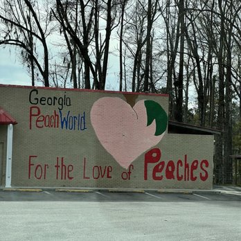 Georgia Peach World - Outside building welcoming sign - Specialty Food Near Me - Townsend, Georgia