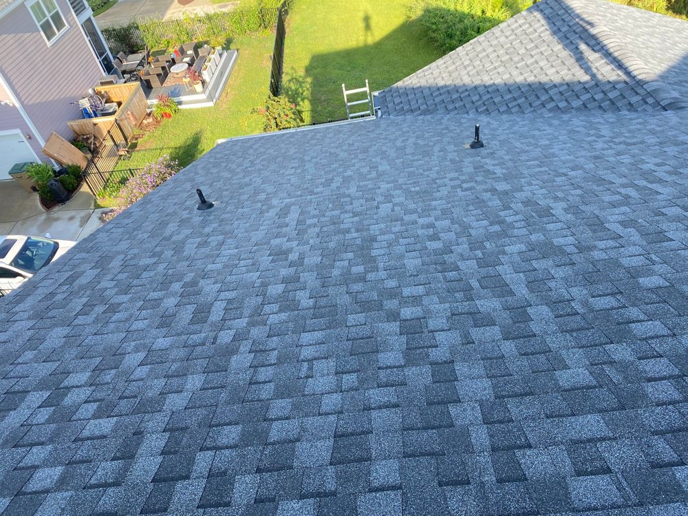 Slide of Precision Roofing