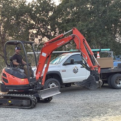 Purist Plumbing and Excavation Logo