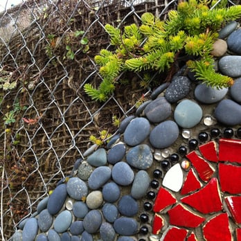 HomeGrown Organics - A custom designed living wall built using burlap, stone and tile. - Landscaping Near Me - Seattle, Washington HomeGrown Organics - A custom designed living wall built using burlap, stone and tile. - Landscaping Near Me - Seattle, Washington