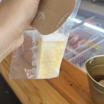 Blocksicle - lemon ginger popsicle with a little folded boat to catch drippings - Ice Cream & Frozen Yogurt Near Me - New Shoreham, Rhode Island