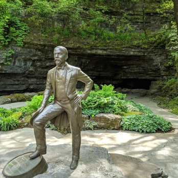 The Jack Daniel Distillery - Jack at the cave - Distilleries Near Me - Lynchburg, Tennessee
