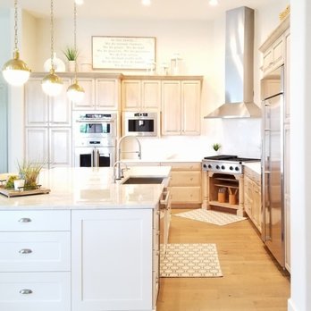 Park Ave Custom Construction - a kitchen with stainless steel appliances - General Contractors Near Me