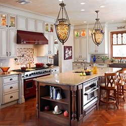MR Planners - Custom Victorian white kitchen cabinetry with built in appliances, professional cooking area with 36" cooking Kitchen Aid gas range and vent