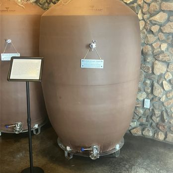 Flying Leap Vineyards - Clay pots they use for some of the wine instead of wood barrels. The sign explains how they were shipped from China. - Wineries Near Me - Elgin, Arizona