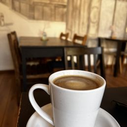 Hot coffee with cream and sugar Hot coffee with cream and sugar