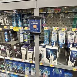 Walmart - Toothbrush case with button.