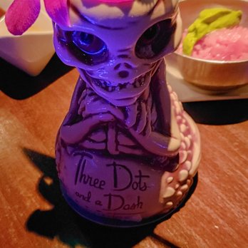 Three Dots and A Dash - "Strong Man" ($16): two kinds of run, cinnamon, falernum, pomegranate, and coconut in a wicked cool skull glass with bendy straw and orchid! - Asian Fusion Near Me - Chicago, Illinois Three Dots and A Dash - "Strong Man" ($16): two kinds of run, cinnamon, falernum, pomegranate, and coconut in a wicked cool skull glass with bendy straw and orchid! - Asian Fusion Near Me - Chicago, Illinois