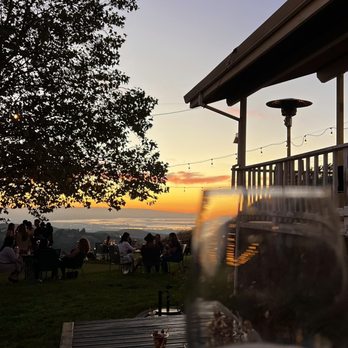 Big Dog Vineyards - a glass of wine on a deck - Venues & Event Spaces Near Me - Milpitas, California