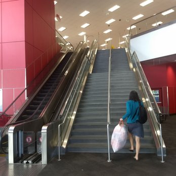 Target - 36 stairs from parking level to store level. Lady has a return item of clothing. Escalator goes down, with cart elevator - Department Stores Near Me - Sunnyvale, California Target - 36 stairs from parking level to store level. Lady has a return item of clothing. Escalator goes down, with cart elevator - Department Stores Near Me - Sunnyvale, California