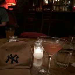 An Orange Cosmo and a New York yankee hat An Orange Cosmo and a New York yankee hat