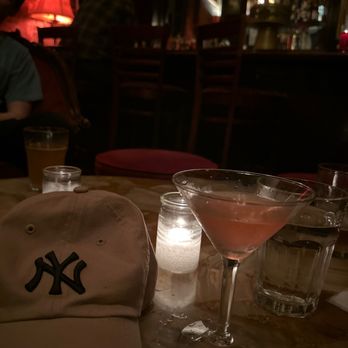 The Auction House - An Orange Cosmo and a New York yankee hat - Lounges Near Me - New York, New York The Auction House - An Orange Cosmo and a New York yankee hat - Lounges Near Me - New York, New York