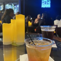 a drink in a plastic cup with a straw a drink in a plastic cup with a straw