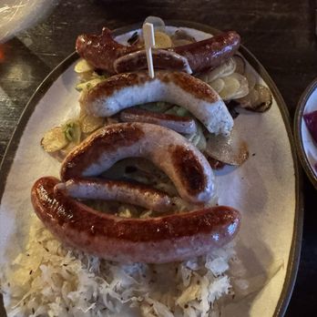Rhein Haus - Sausage platter with Sauerkraut and potato salad - Bars Near Me - Denver, Colorado