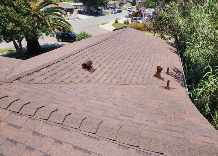 Slide of CV Roofing Services