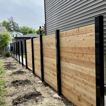 Delgado Welding - Cedar with 4x4 steel posts during install - Fences & Gates Near Me Delgado Welding - Cedar with 4x4 steel posts during install - Fences & Gates Near Me