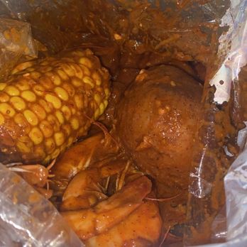 Craving Crab Haus - 1lb shrimp, order of potatoes, half pound of sausage, a corn, and one boiled egg. The whole shabang and extra spicy - Cajun/Creole Near Me - Riverside, California
