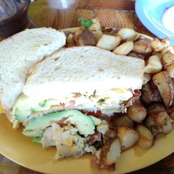 Squeeze In - The Garth breakfast sandwich with home fries - Breakfast & Brunch Near Me - Reno, Nevada Squeeze In - The Garth breakfast sandwich with home fries - Breakfast & Brunch Near Me - Reno, Nevada