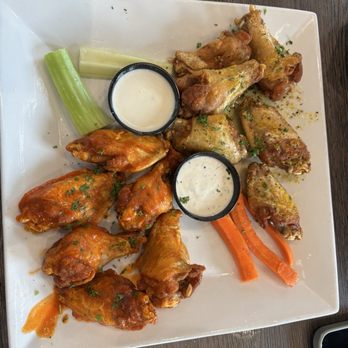Spectators Bar & Grill - 1/2 Lemon pepper 1/2 buffalo - Sports Bars Near Me - Richmond, Texas Spectators Bar & Grill - 1/2 Lemon pepper 1/2 buffalo - Sports Bars Near Me - Richmond, Texas