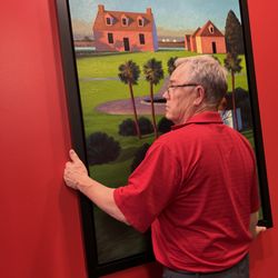 Harris Holt Picture Framing & Art Consulting - Harris installing a beautiful oil painting for a client