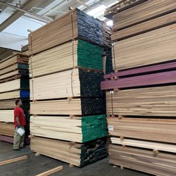 Moore Newton Quality Hardwoods - Tall stacks of hardwood