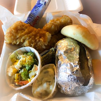 Sawmill Saloon - Broasted cod, broccoli slaw, baked potato, and roll. - American Near Me - Hayward, Wisconsin