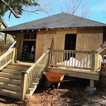 Diverse Renovations - a house being built with a wooden deck - General Contractors Near Me