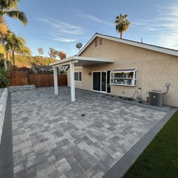 Side yard turf, planter and wall, pavers, patio cover Side yard turf, planter and wall, pavers, patio cover