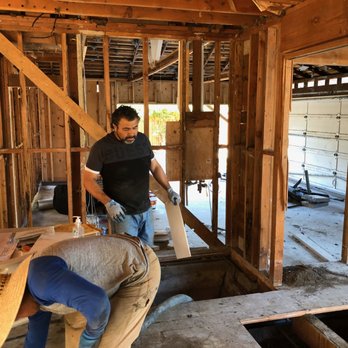Basil Zaru Construction - two men working on a house - General Contractors Near Me Basil Zaru Construction - two men working on a house - General Contractors Near Me