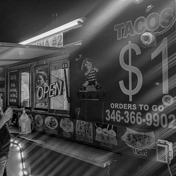 Tacos Laguna #2 - a man standing in front of a food truck - Tacos Near Me - Houston, Texas Tacos Laguna #2 - a man standing in front of a food truck - Tacos Near Me - Houston, Texas