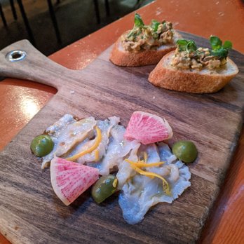 Tavolàta Belltown - Geoduck crudo and black cod bruschetta - Italian Near Me - Seattle, Washington Tavolàta Belltown - Geoduck crudo and black cod bruschetta - Italian Near Me - Seattle, Washington