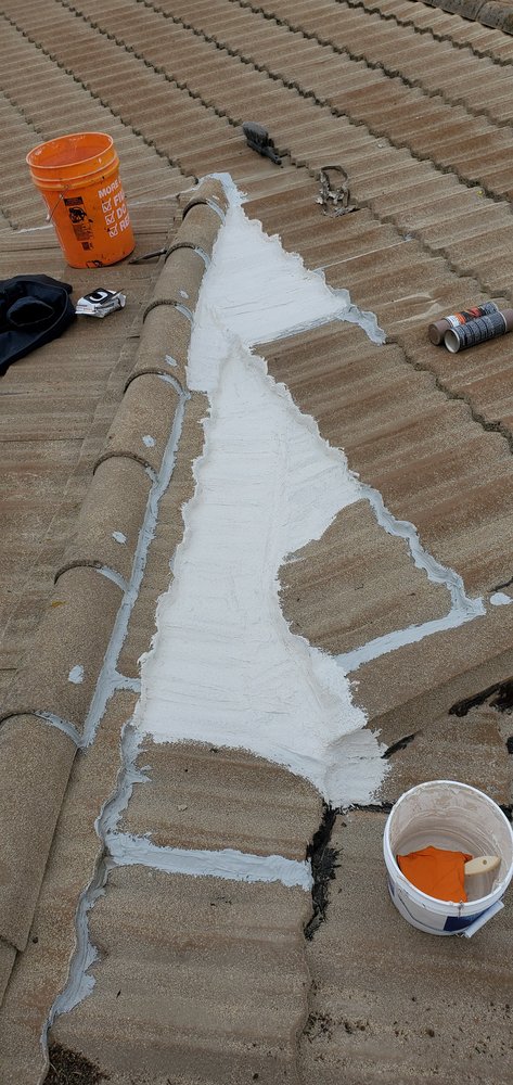 Slide of Three Clovers Roofing