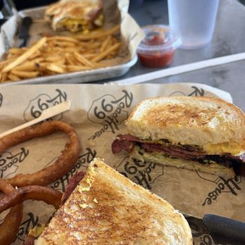 Roadhouse - Pastrami sandwich and onion rings, pork belly, egg sandwich, and french fries - New American Near Me - Kingsburg, California Roadhouse - Pastrami sandwich and onion rings, pork belly, egg sandwich, and french fries - New American Near Me - Kingsburg, California