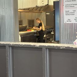 Krekel's West - Woman touching buns with no gloves