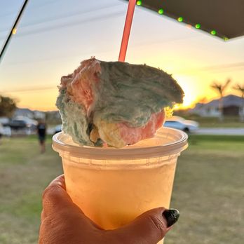 The Lemonade Express - a hand holding a cup of lemonade - Food Trucks Near Me The Lemonade Express - a hand holding a cup of lemonade - Food Trucks Near Me