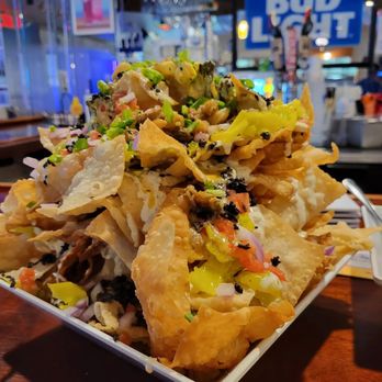 Live Bait - Mile high Greek seafood nachos - Bars Near Me - Orange Beach, Alabama