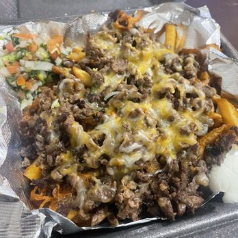 Mas Chingon Mexican Grill - Carne asada fries w/ pico and sour cream on the side - Food Trucks Near Me - Salado, Texas Mas Chingon Mexican Grill - Carne asada fries w/ pico and sour cream on the side - Food Trucks Near Me - Salado, Texas