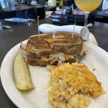 The Toasted Yolk Cafe - Turkey Reuben w/ hash brown casserole - Breakfast & Brunch Near Me - Birmingham, Alabama The Toasted Yolk Cafe - Turkey Reuben w/ hash brown casserole - Breakfast & Brunch Near Me - Birmingham, Alabama