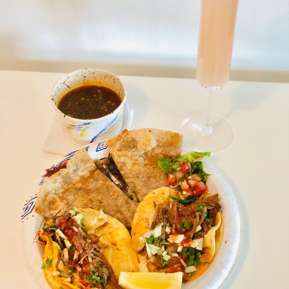 a plate of food and a drink a plate of food and a drink
