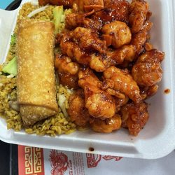 Orange Chicken, spicy vegetable fried rice, and an egg roll