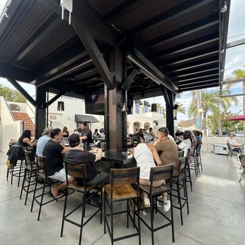 Shelter Distilling - Big outdoor bar with TVs - Cocktail Bars Near Me - Dana Point, California