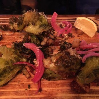 ProAbition - Half eaten pork and brussel sprouts - New American Near Me - Riverside, California ProAbition - Half eaten pork and brussel sprouts - New American Near Me - Riverside, California
