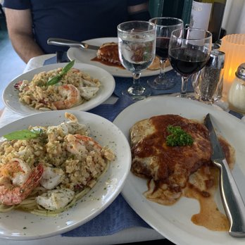 Chef Vola's - chicken parm and crab, jumbo shrimp and chopped clams over linguine - plated as shared portions - Italian Near Me - Atlantic City, New Jersey